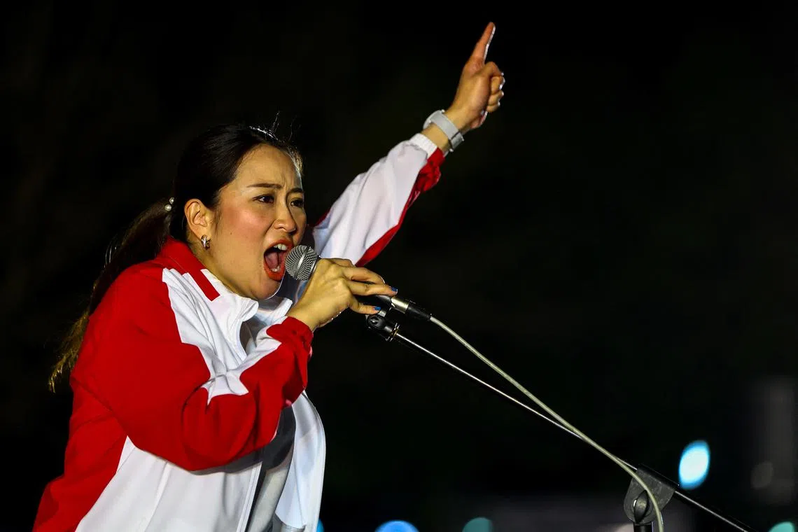 Paetongtarn Shinawatra, 36, the Pheu Thai Party's most visible candidate for prime minister, speaks during the general election campaign in Ubon Ratchathani province on Friday. 