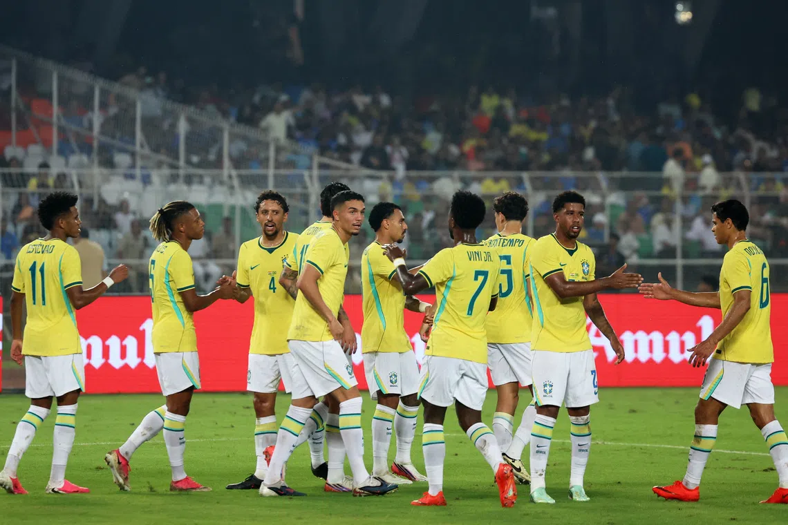 Soccer Football - International Friendly - India v Brazil - Salt Lake Stadium, Kolkata, India - October 3, 2026 Brazil's Estevao celebrates scoring their first goal with teammates REUTERS/Sahiba Chawdhary