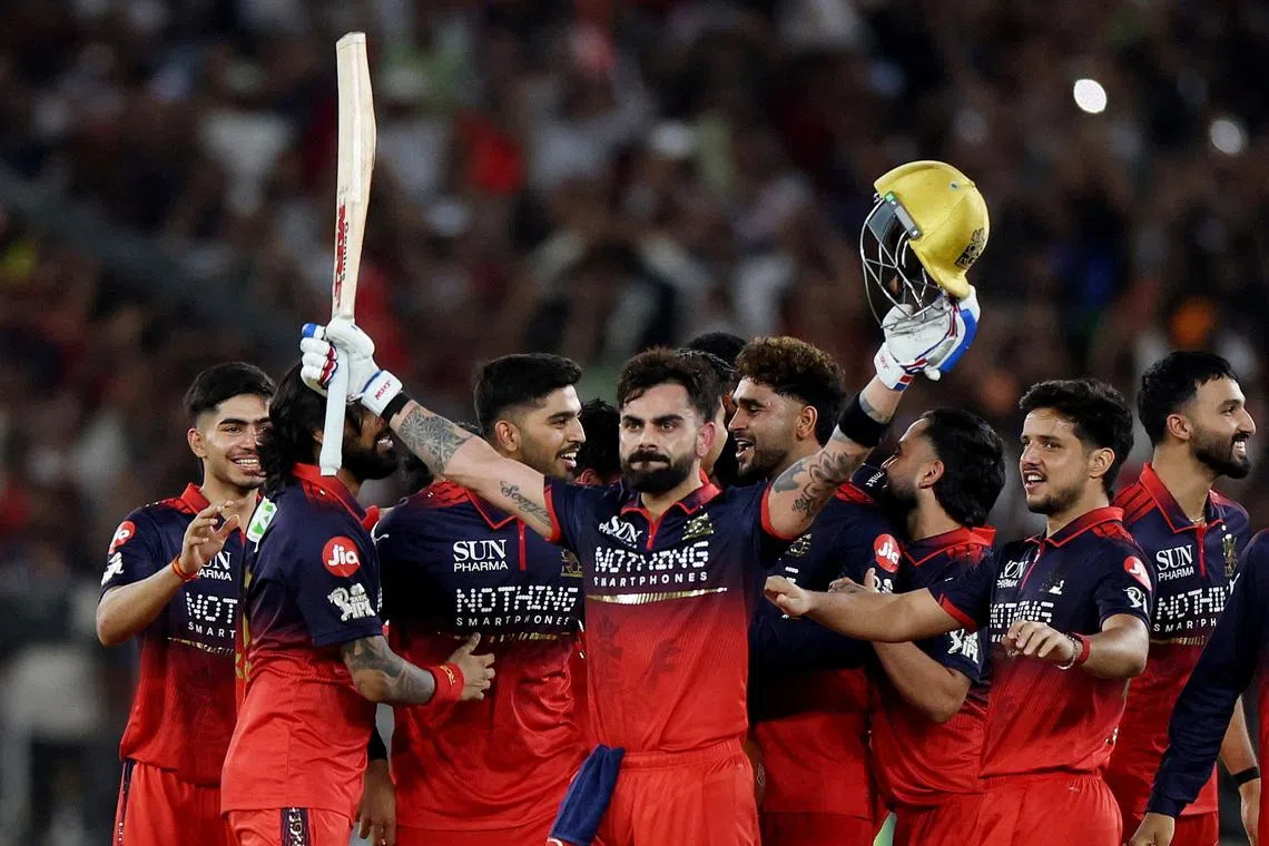 Cricket - Indian Premier League - IPL - Final - Royal Challengers Bengaluru v Gujarat Titans - Narendra Modi Stadium, Ahmedabad, India - May 31, 2026 Royal Challengers Bengaluru's Virat Kohli celebrates with teammates after winning the Indian Premier League REUTERS/Amit Dave