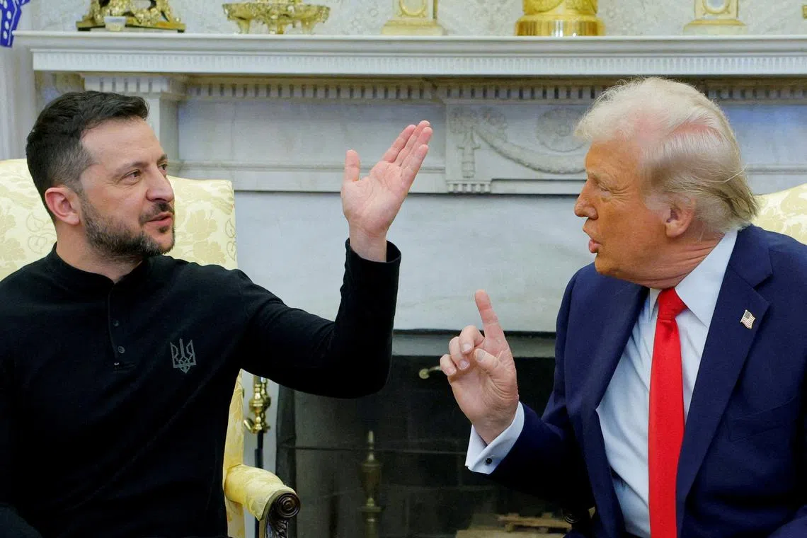 FILE PHOTO: U.S. President Donald Trump meets with Ukrainian President Volodymyr Zelenskiy at the White House in Washington, D.C., U.S., February 28, 2025. REUTERS/Brian Snyder/File Photo