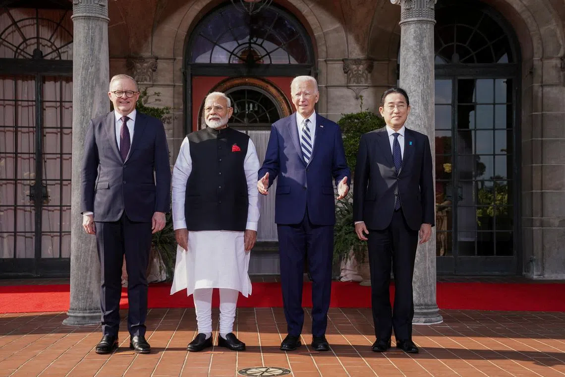 U.S. President Joe Biden, Japan's Prime Minister Fumio Kishida, Australia's Prime Minister Anthony Albanese and India's Prime Minister Narendra Modi take part in a Quad leaders summit family photo in Claymont, Delaware, U.S., September 21, 2024.  REUTERS/Kevin Lamarque