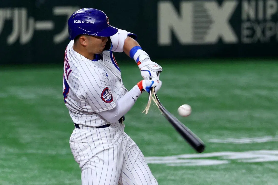 Chicago Cubs' Seiya Suzuki in action as the bat breaks, during the Major League Baseball during the match between Chicago Cubs and Los Angeles Dodgers held at the Tokyo Dome, in Tokyo, Japan, on March 18, 2025.