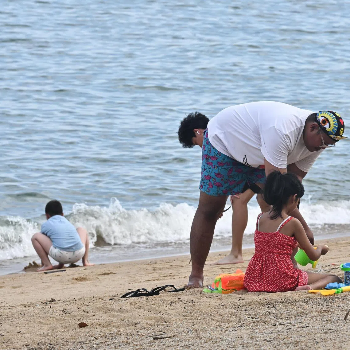 Beachgoers playing inside barricaded area near Marine Cove at East Coast Park at 5.08pm on July 4, 2024.