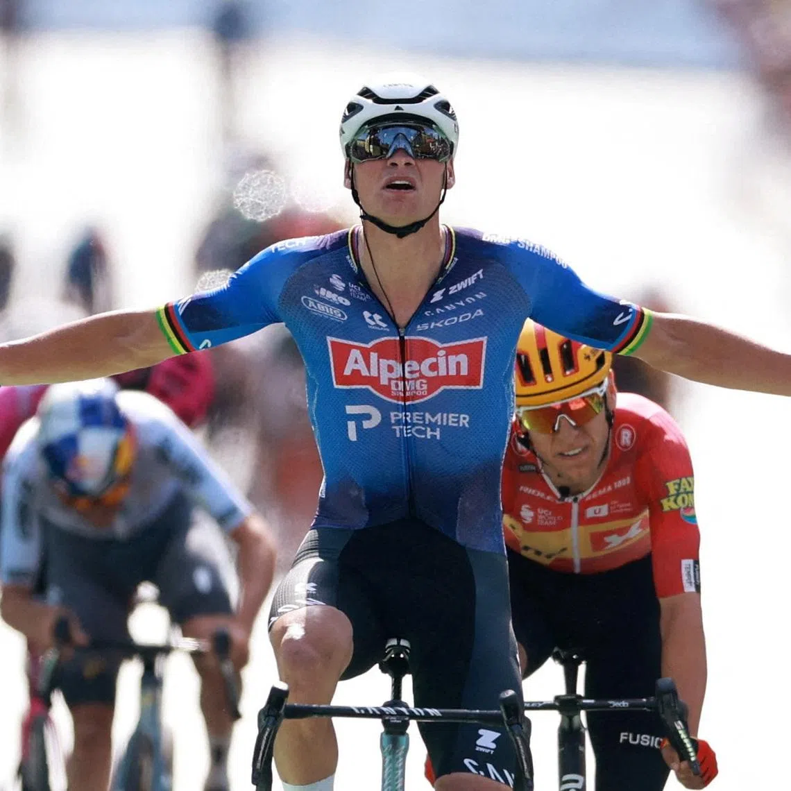 Premier Tech’s Mathieu Van Der Poel celebrates winning stage 9 in Ussel, France.