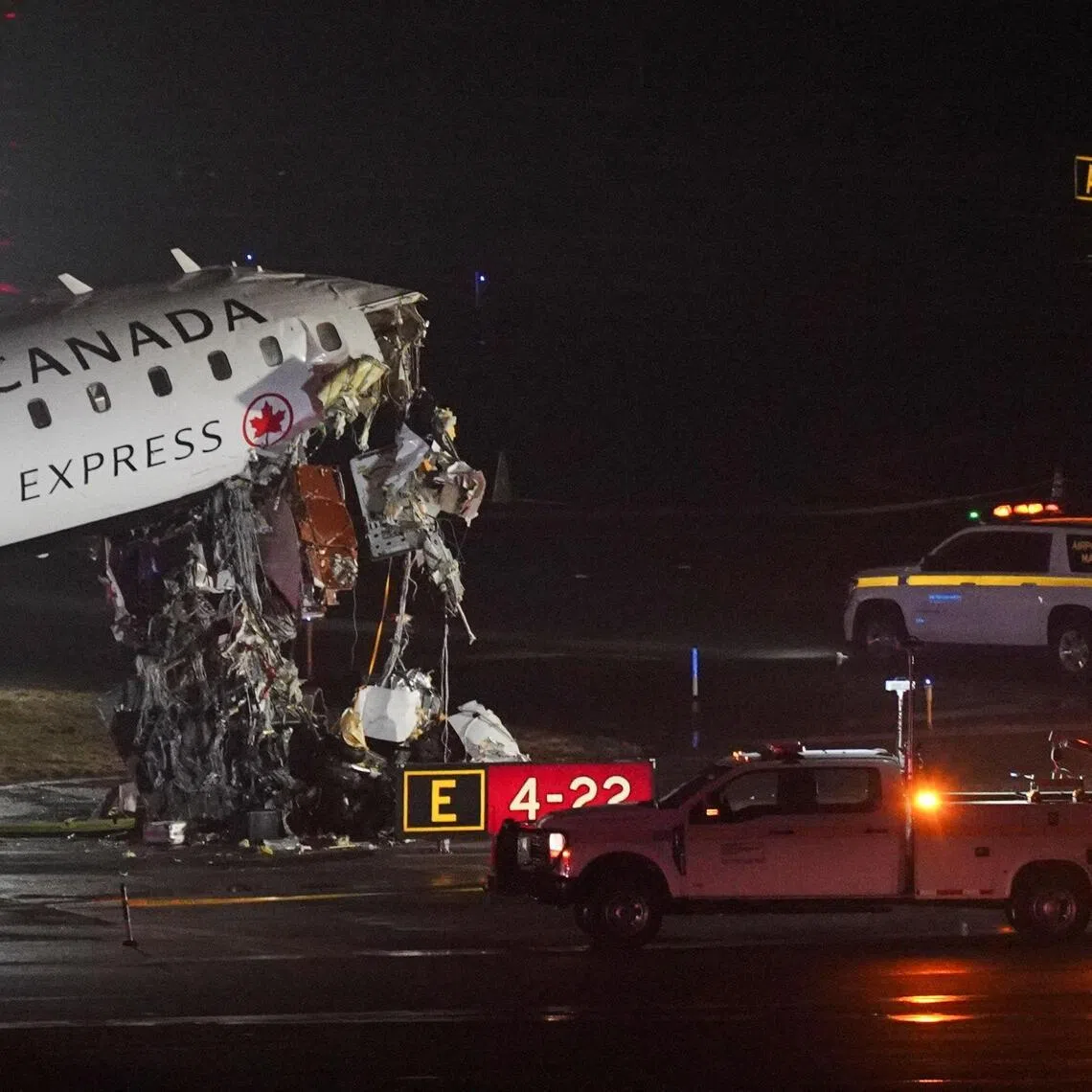 Damage to an Air Canada Express jet that had collided with a ground vehicle at New York's La Guardia Airport in Queens, New York, US on March 23, 2026. 