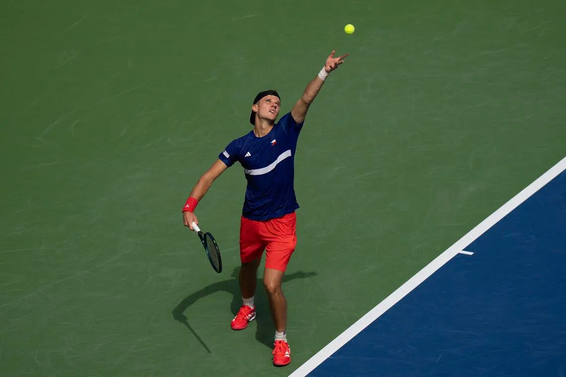 Jakub Mensik of the Czech Republic in Davis Cup action at Delray Beach in Florida on Sept 13. He won the decisive final singles match against American Frances Tiafoe 6-1, 6-4 to upset the record champions and send his nation to the Davis Cup Finals in November.