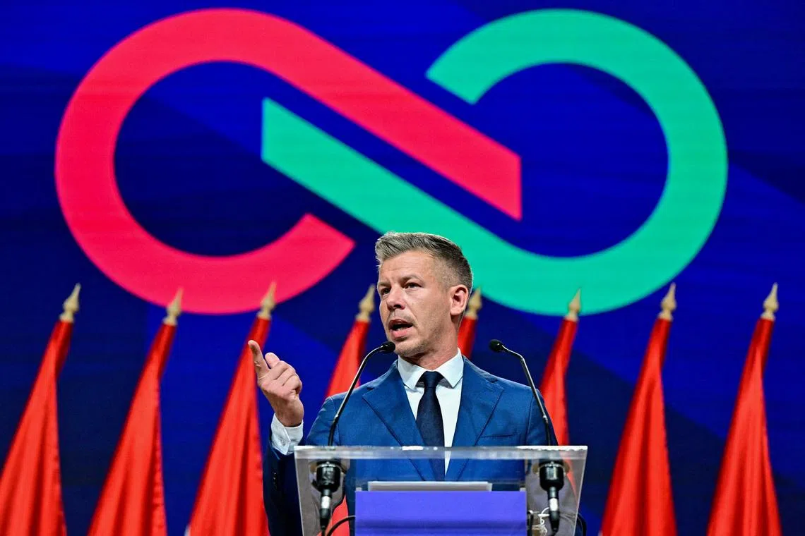 FILE PHOTO: Peter Magyar, leader of the opposition Tisza Party, speaks during a press conference a day after the parliamentary election, in which Hungarian Prime Minister Viktor Orban conceded defeat, Budapest, Hungary, April 13, 2026. REUTERS/Marton Monus/File Photo