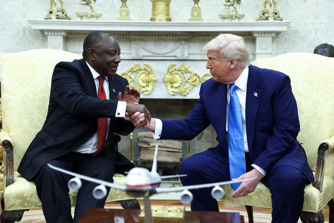 U.S. President Donald Trump meets South African President Cyril Ramaphosa in the Oval Office of the White House in Washington, D.C., U.S., May 21, 2025. REUTERS/Kevin Lamarque