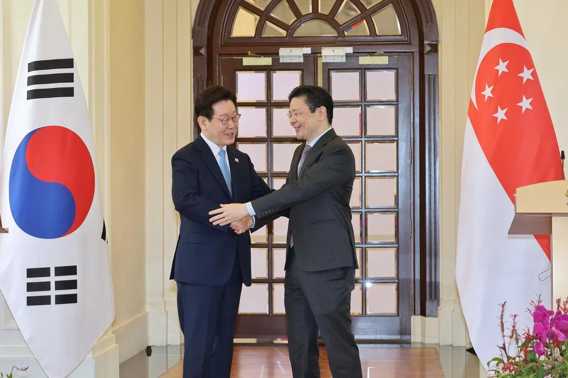 Prime Minister Lawrence Wong (right) meeting South Korean President Lee Jae Myung on March 2.