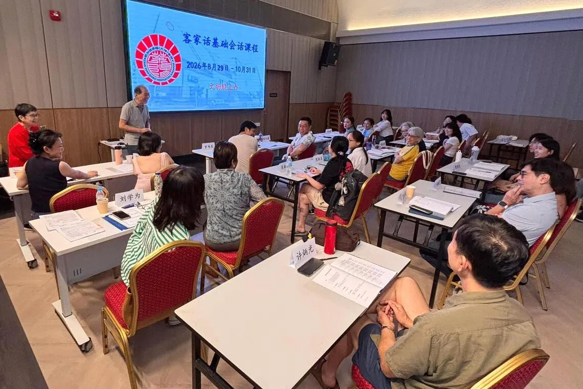 Hakka instructors Wong Lee Foon (left, in red) and Wong Chin Fee (right) at a Hakka class at Char Yong (Dabu) Association on Aug 29.