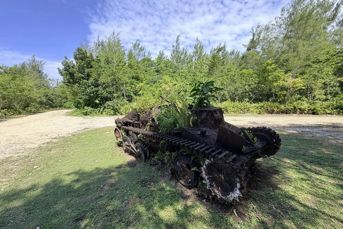 A Type 95 Ha-Go Light Tank used by the Japanese military remains in the same spot it was shot through by US forces,