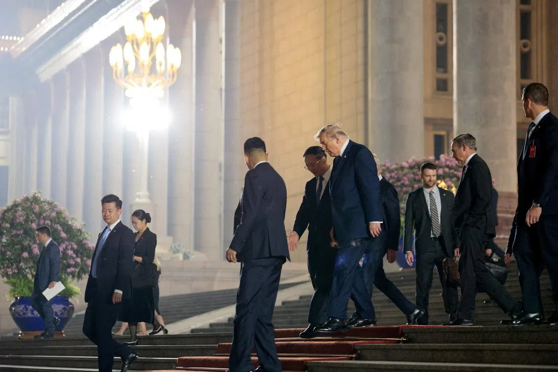 US President Donald Trump and Chinese Vice Foreign Minister Ma Zhaoxu walking outside the Great Hall of the People after attending a state banquet with Chinese President Xi Jinping (not pictured), in Beijing, China, May 14.