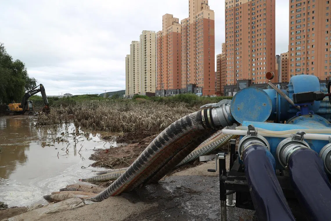 epa10795154 (230811) -- HARBIN, Aug. 11, 2023 (Xinhua) -- Drainage operation is carried out at a flooded field in Shangzhi City, northeast China's Heilongjiang Province, 11 August 2023. In recent days, torrential rainstorms and floods have wreaked havoc in northeast China's Heilongjiang Province. Local authorities have intensified flood relief and reconstruction efforts, including restoring essential infrastructures, carrying out drainage operation and revitalizing agricultural production, to restore normalcy to the lives and production of flood-affected regions.  EPA-EFE/XINHUA / ZHANG TAO CHINA OUT / UK AND IRELAND OUT  /       MANDATORY CREDIT  EDITORIAL USE ONLY
