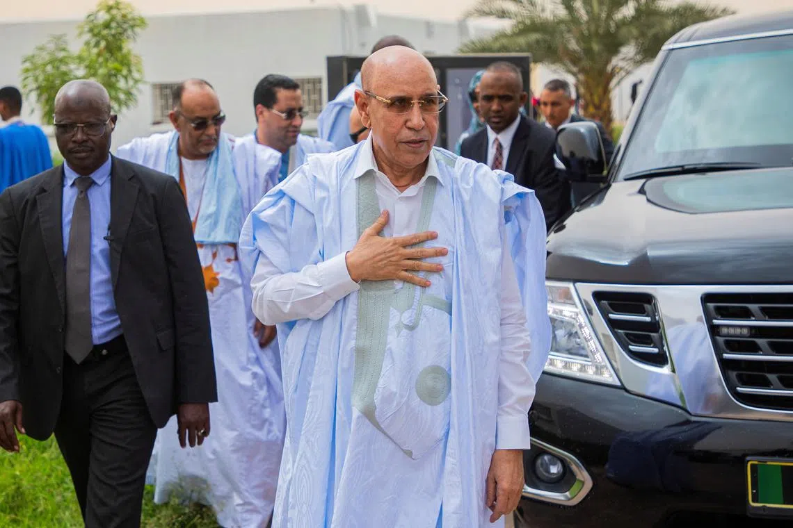 Mauritania's President Mohamed Ould Ghazouani arrives to cast his vote in the country's presidential election in Nouakchott, Mauritania June 29, 2024.REUTERS/Stringer