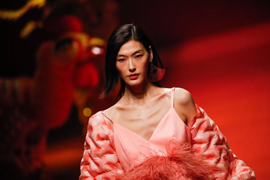 A model presents a creation by Cindy Wei Zhang Studio during the China Fashion Week Autumn/Winter 2023 in Beijing, China, March 25.