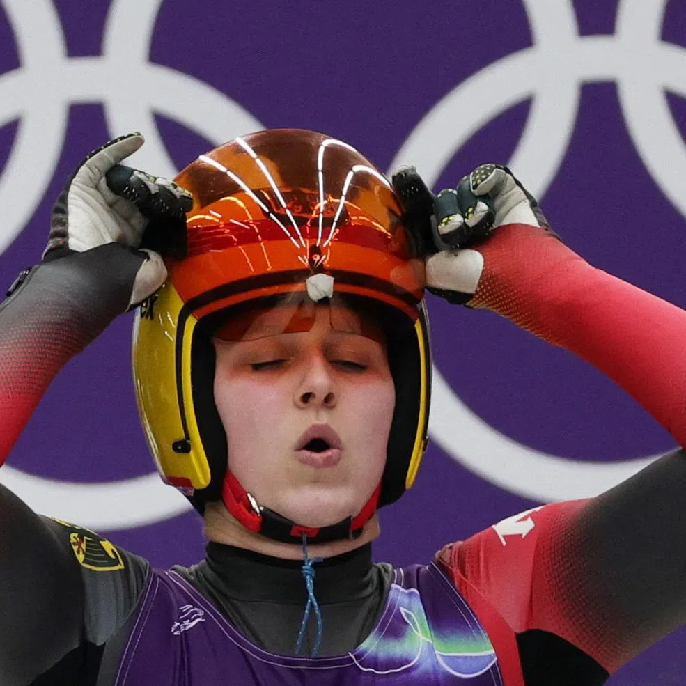Milano Cortina 2026 Olympics - Luge - Women's Singles Run 1 - Cortina Sliding Centre, Cortina d'Ampezzo, Italy - February 09, 2026. Merle Malou Fraebel of Germany reacts ahead of start of her run REUTERS/Athit Perawongmetha