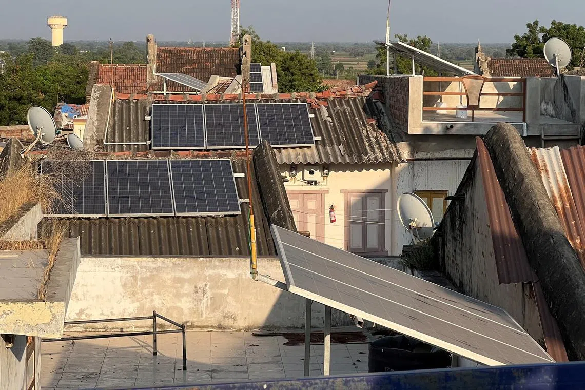 Solar panels are installed on the rooftops of residential houses in Modhera, India's first round-the-clock solar-powered village, in the western state of Gujarat, India, October 19, 2022. 
