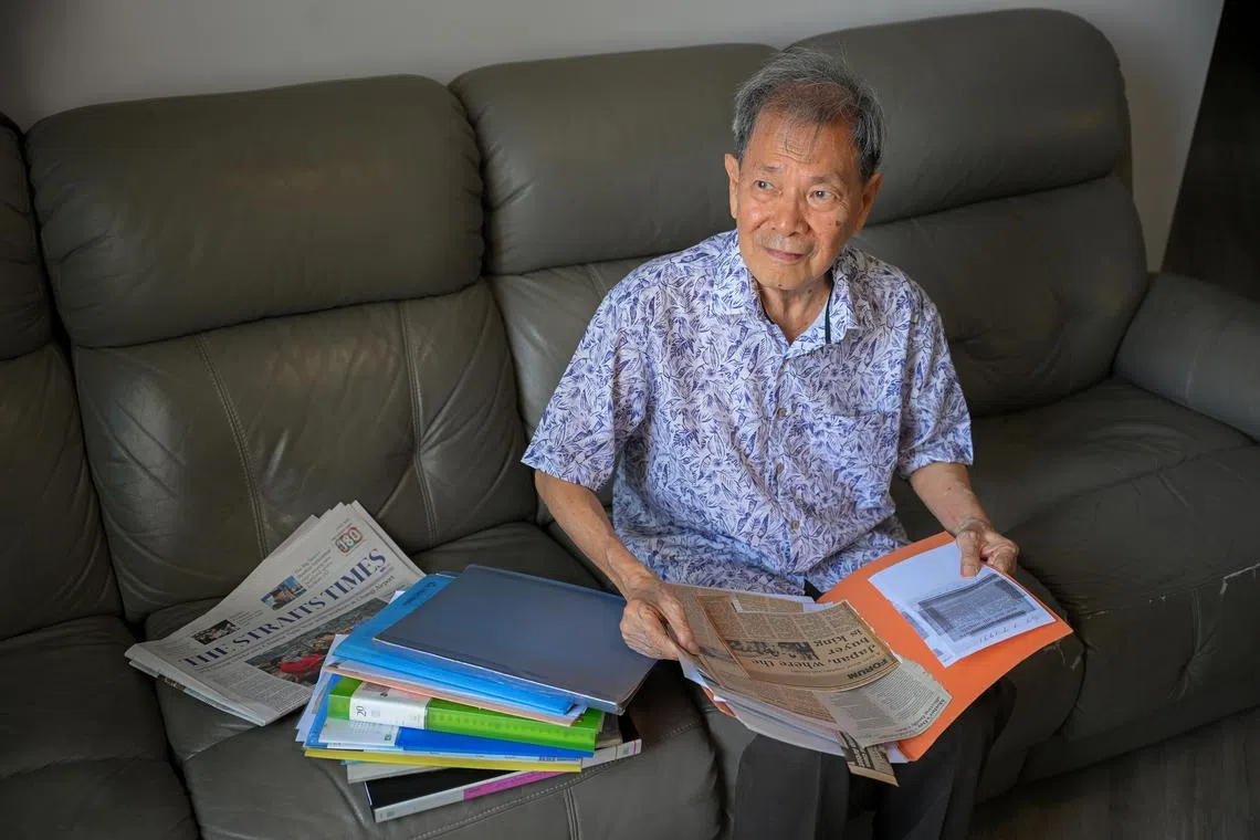 Mr Jeffrey Law Lee Beng at home with newspaper clippings from his contributions to the ST Forum page.
