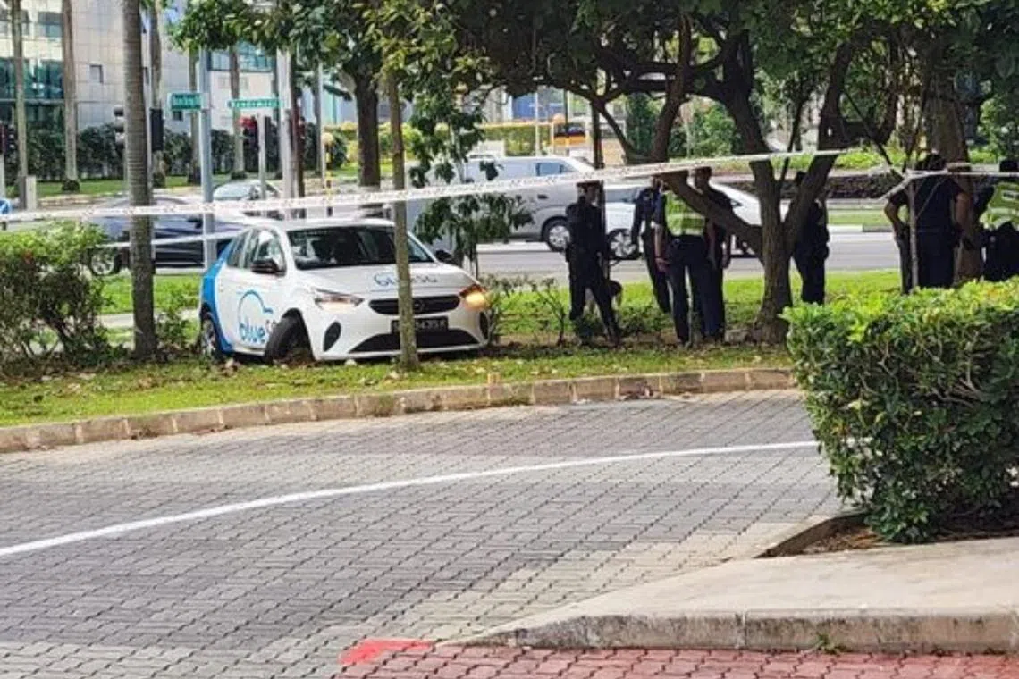 The rental car had mounted the curb on Boon Keng Road and stopped on a grass verge while being pursued by the police. 