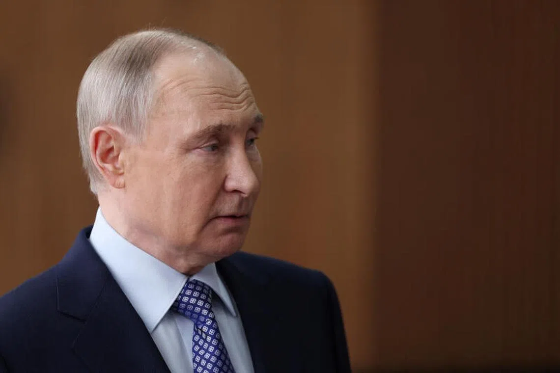 Russia's President Vladimir Putin speaks with journalists during a meeting in Moscow, Russia, April 21, 2025. Sputnik/Vyacheslav Prokofyev/Pool via REUTERS ATTENTION EDITORS - THIS IMAGE WAS PROVIDED BY A THIRD PARTY.