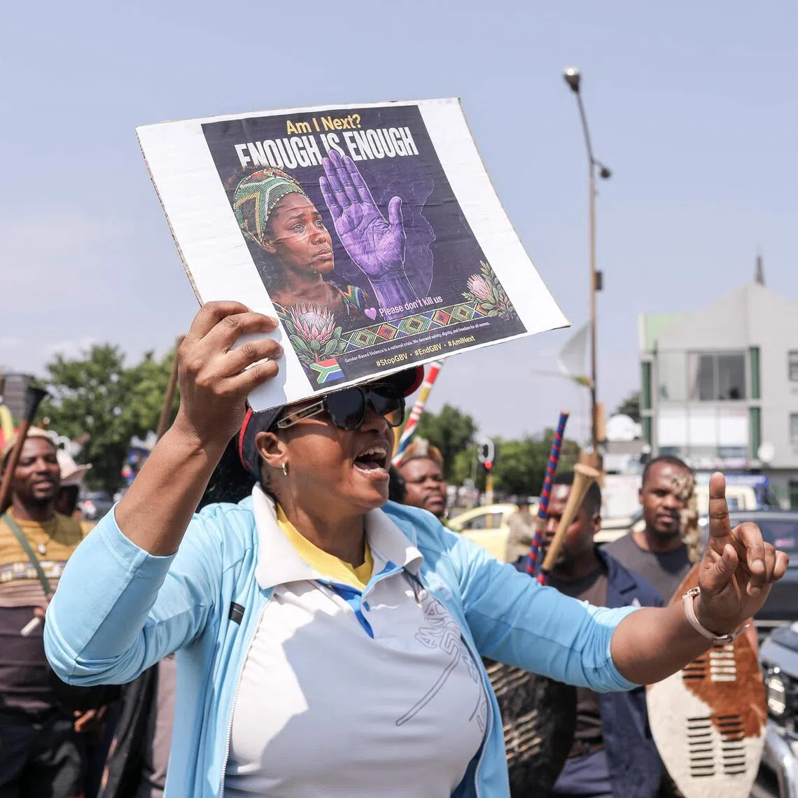 People protesting in the city of Kempton Park, South Africa, on Sept 19, following a string of murders of women east of Johannesburg.