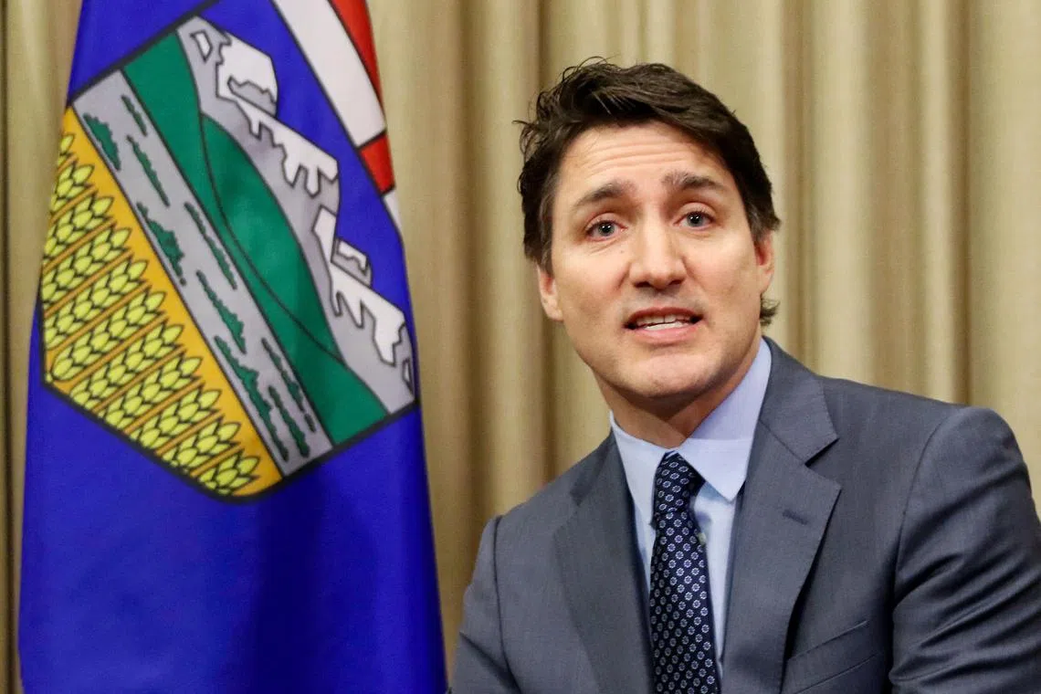 FILE PHOTO: Canada's Prime Minister Justin Trudeau speaks during a meeting with Alberta Premier Danielle Smith in Calgary, Alberta, Canada March 13, 2024. REUTERS/Dave Chidley/File Photo