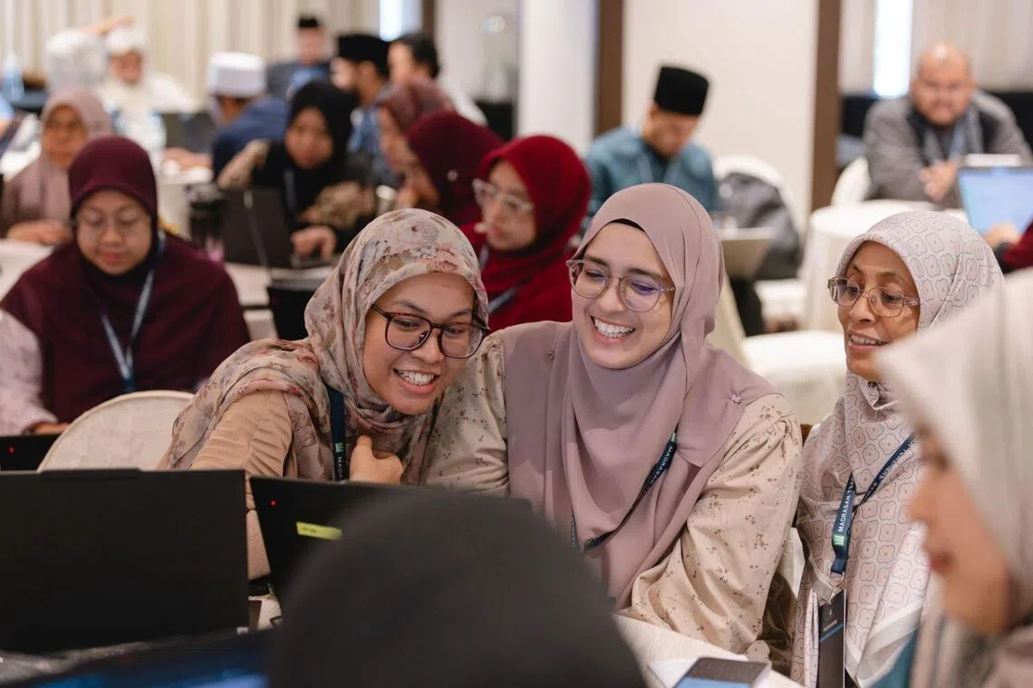 Participants collaborating during the Madrasah Teachers’ Symposium held on Nov 25, 2025, which featured workshops on using digital tools in teaching.