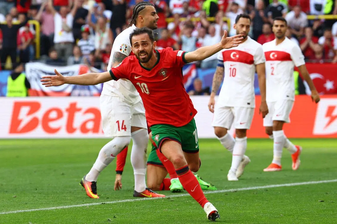 Portugal's Bernardo Silva celebrates scoring their first goal, his first at a major tournament.