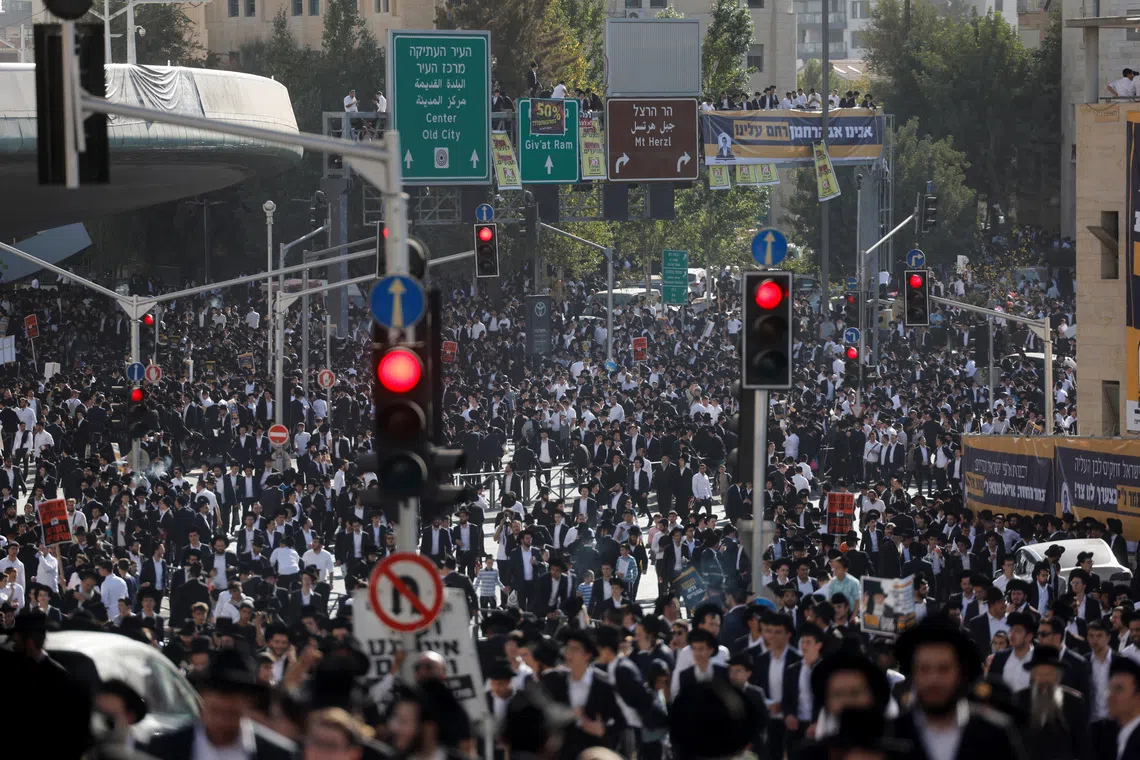 Thousands of Ultra-Orthodox Jews gather on the day they rally in a \"million man\" protest against Israeli military conscription in Jerusalem October 30, 2025. REUTERS/Ammar Awad
