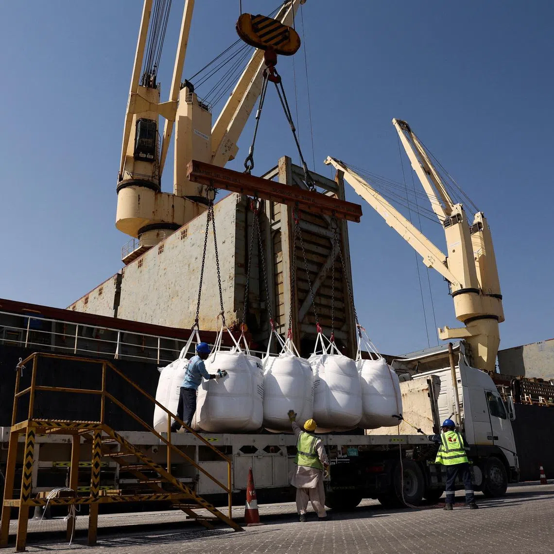 Cargo is loaded at the Port of Fujairah, as the U.S.-Israel conflict with Iran limits marine traffic in the Strait of Hormuz, in Fujairah, United Arab Emirates, May 6, 2026. REUTERS/Amr Alfiky