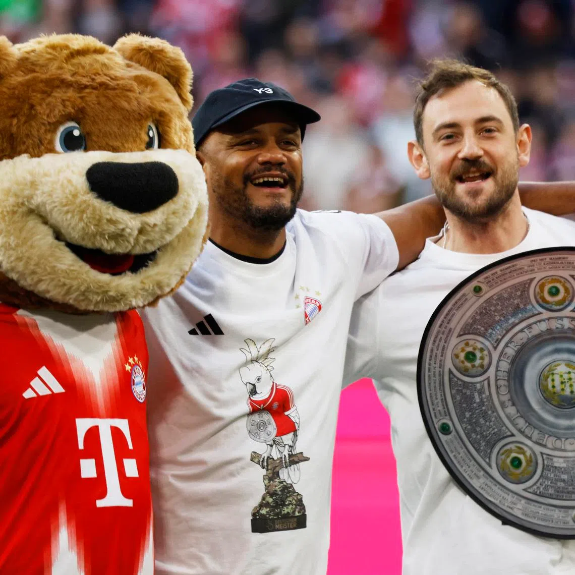 Soccer Football - Bundesliga - Bayern Munich v VfB Stuttgart - Allianz Arena, Munich, Germany - April 19, 2026 Bayern Munich coach Vincent Kompany celebrates after winning the Bundesliga REUTERS/Michaela Stache