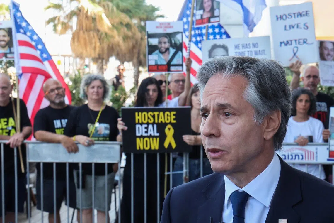 US Secretary of State Antony Blinken talks to reporters after meeting with families and supporters of Israelis held hostage in Gaza by Hamas, who rallied during his visit, in Tel Aviv, Israel June 11, 2024.  JACK GUEZ/Pool via REUTERS