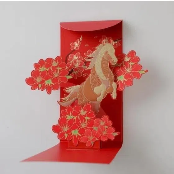 (Clockwise from top left) Red packets from EFG, , Singapore Chinese Cultural Centre, Papercranes Design and Lyf.