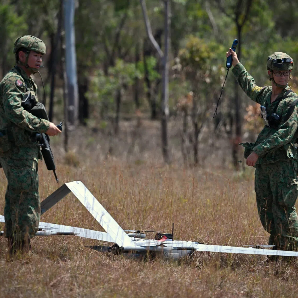 SAF soldiers from the Tactical Unmanned Aerial Vehicle Company preparing the V15 UAV for flight during Exercise Wallaby on Oct 26.