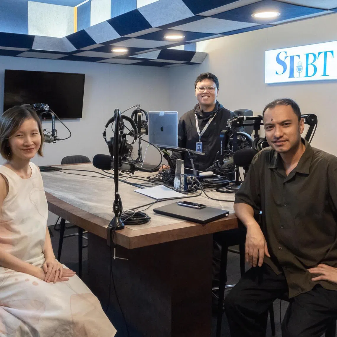 (From left to right): ST's Deputy News Editor, Grace Ho, Podcast Producer, Hadyu Rahim & ST's Podcast Editor, Ernest Luis in the podcast studio.