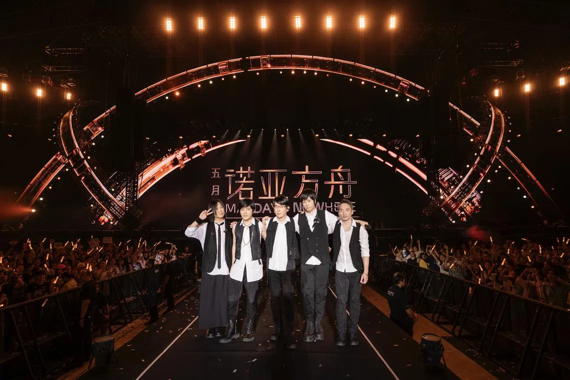 Taiwanese rock band Mayday, consisting (from left) bassist Masa, guitarist Monster, drummer Guan You, lead vocalist Ashin and guitarist Stone at the National Stadium on Jan 14.