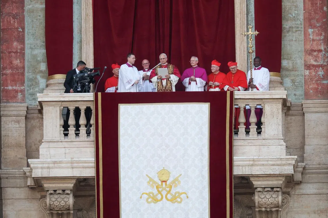 Newly elected Pope Leo XIV, Cardinal Robert Prevost delivering the 'Urbi et Orbi' message from the balcony of St. Peter's Basilica at the Vatican on May 8.REUTERS/Hannah McKay 