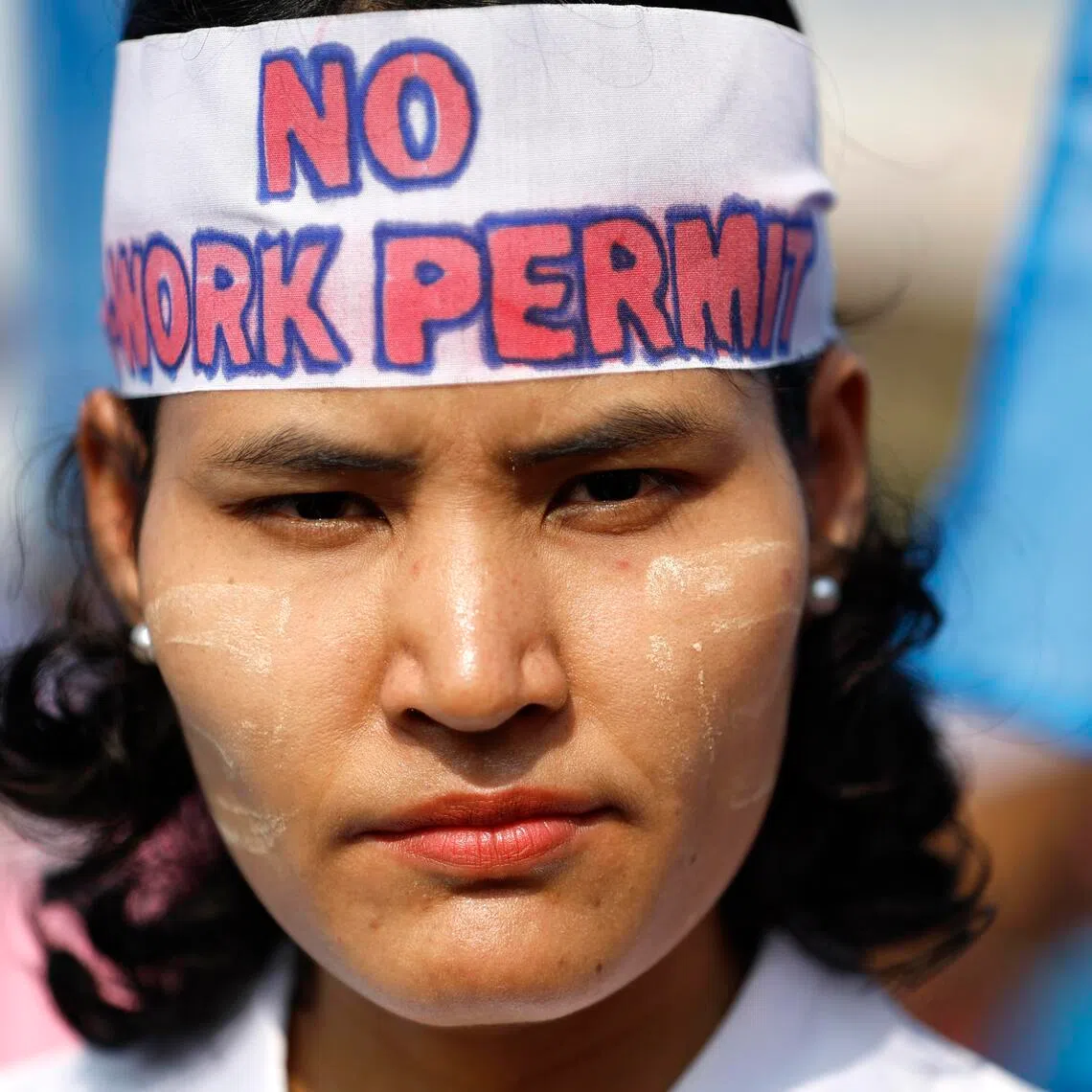 A Myanmar migrant worker during a demonstration to mark Labor Day in Bangkok.