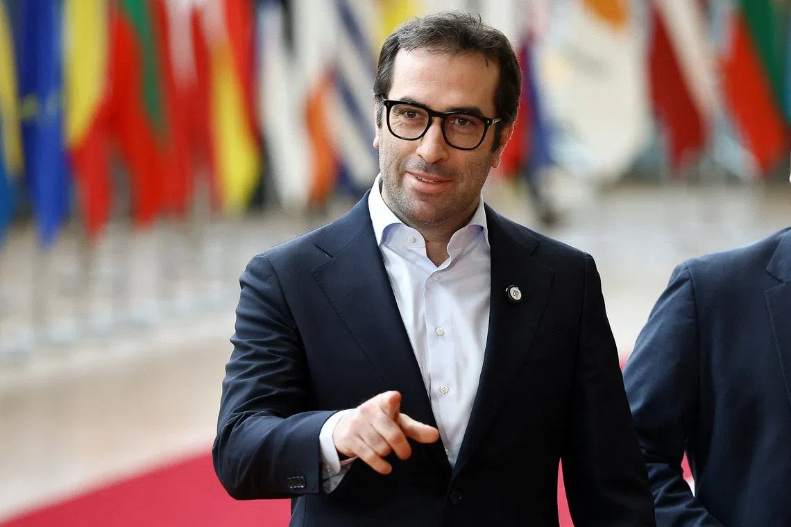 FILE PHOTO: Spanish Economy Minister Carlos Cuerpo gestures on the day of a Eurogroup Finance Ministers meeting in Brussels, Belgium December 11, 2025. REUTERS/Yves Herman/File Photo