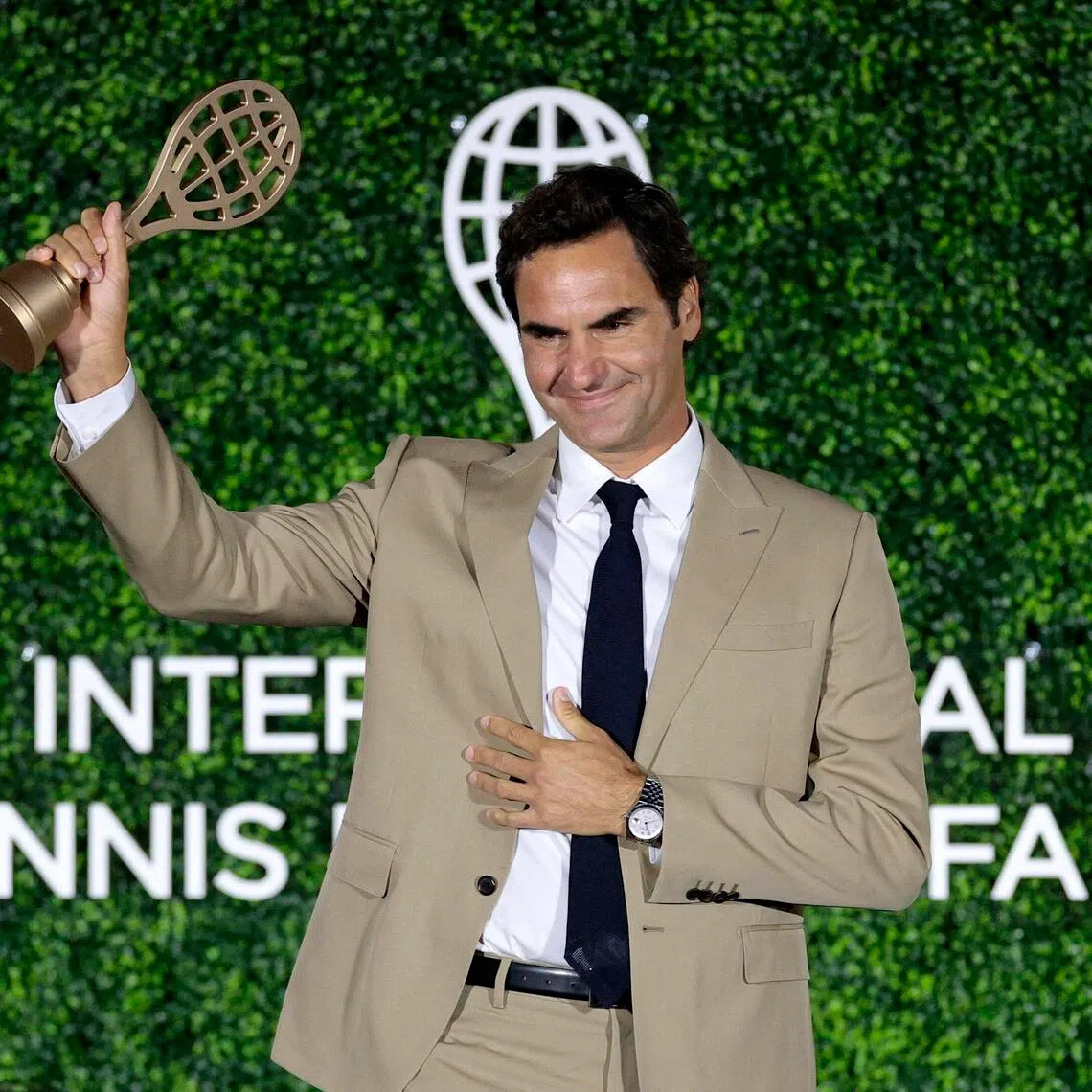Roger Federer acknowledging the crowd after being inducted into the International Tennis Hall of Fame on Aug 29.