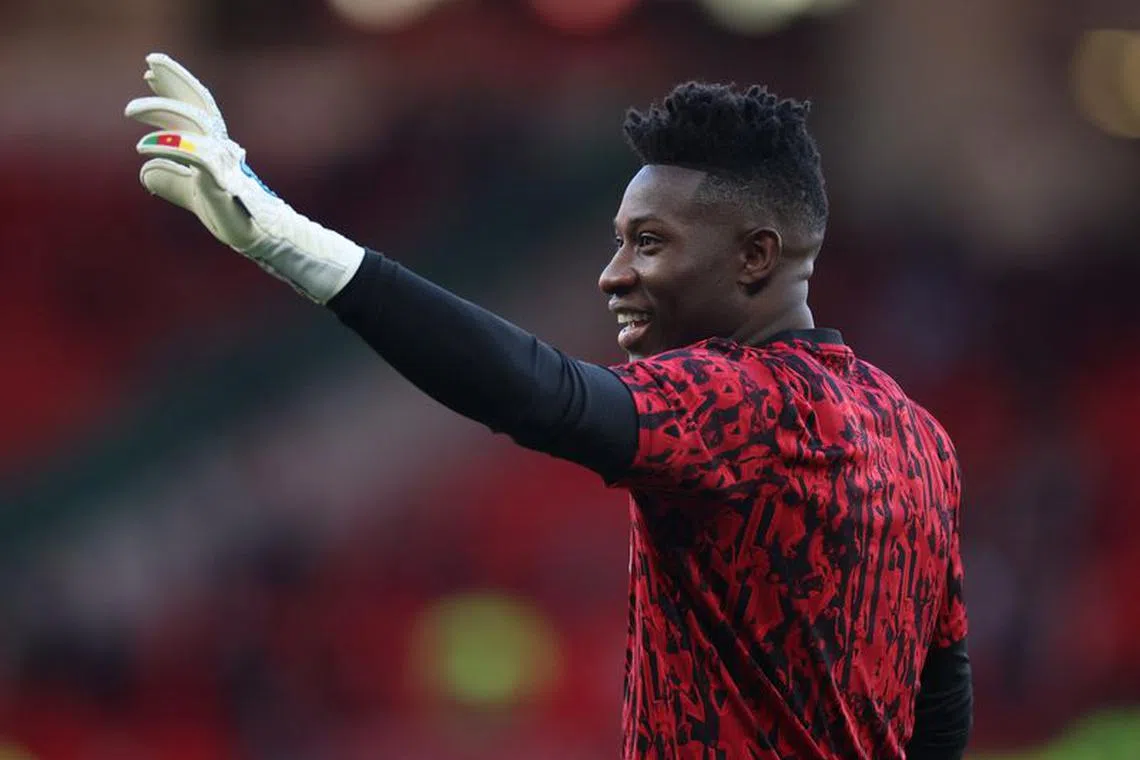 Soccer Football - Premier League - Manchester United v Luton Town - Old Trafford, Manchester, Britain - November 11, 2023 Manchester United's Andre Onana during the warm up before the match REUTERS/Phil Noble / File Photo