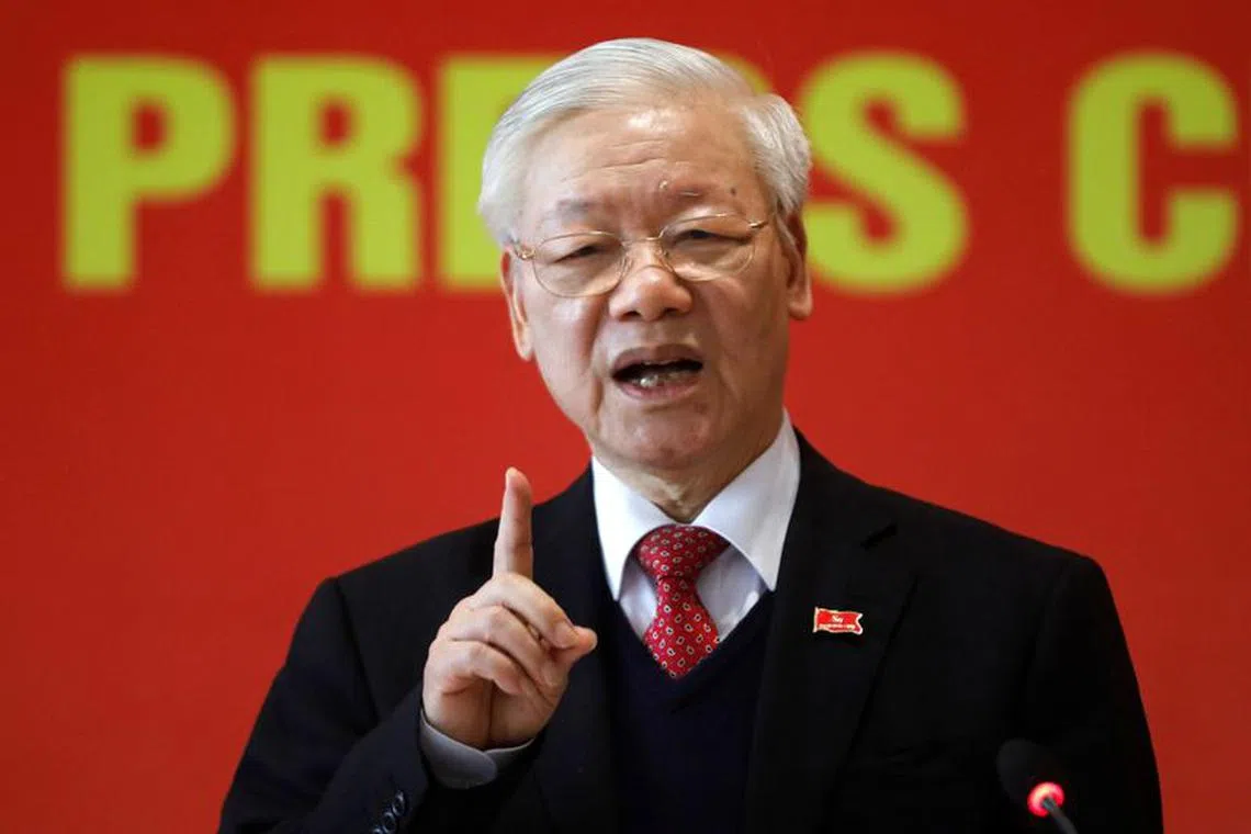 FILE PHOTO: Vietnam's President Nguyen Phu Trong speaks at a news conference after he is re-elected as Communist Party's General Secretary for the 3rd term after the closing ceremony of 13th national congress of the ruling communist party in Hanoi, Vietnam February 1, 2021. REUTERS/Kham/File Photo