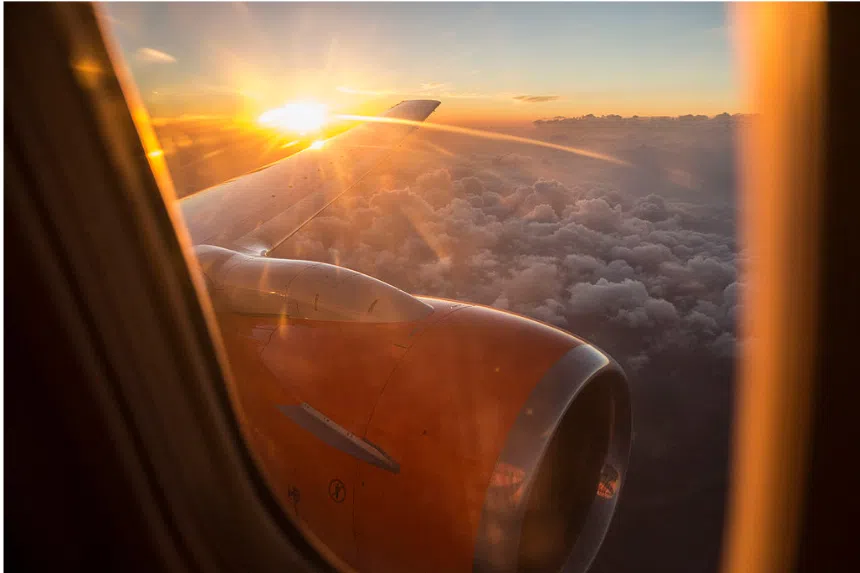 Best sunscreens to use on holiday: Sun shining through plane window