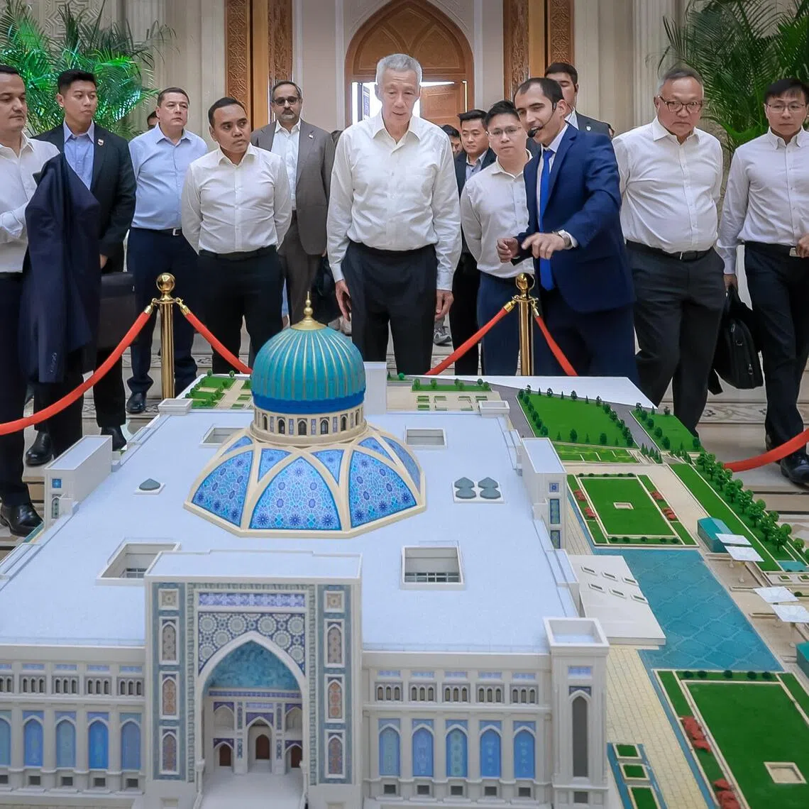 Senior Minister Lee Hsien Loong, Minister of State for Foreign Affairs and Home Affairs Zhulkarnain Abdul Rahim, and Member of Parliament Foo Cexiang tour the Islamic Civilisation Centre in Tashkent, Uzbekistan, on Aug 28.
