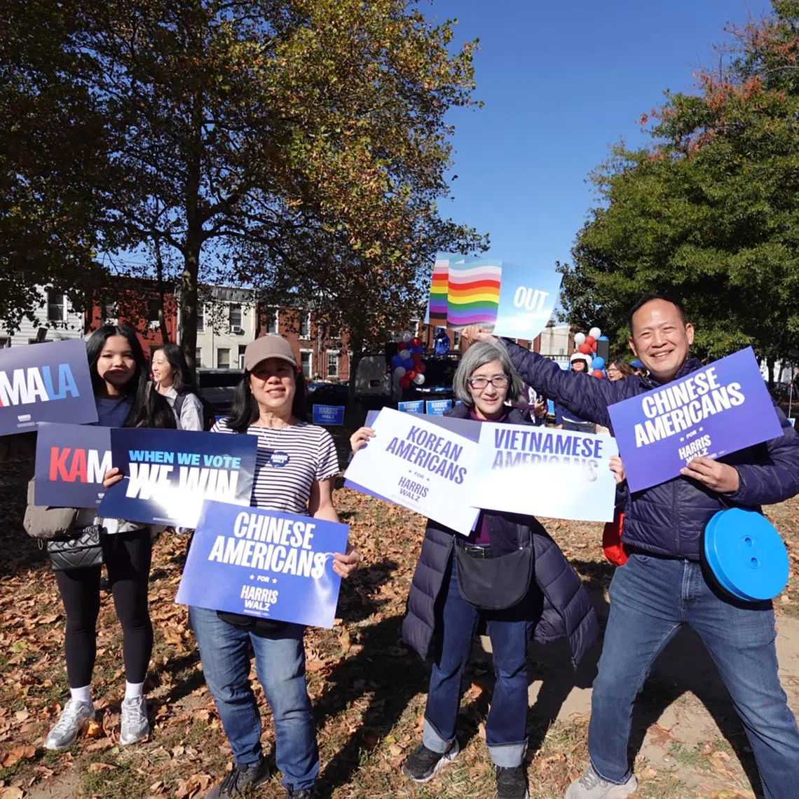 Ms Tilly Chang (second from left), Ms Andrea Wong (second from right), and Mr Alex Sun (right) travelled to Philadelphia from their home states to canvas for Ms Harris.