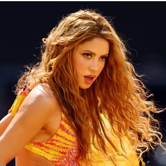 (Clockwise from top left) Former Brazil football players Ronaldinho and Ronaldo appear on stage with Madonna. Shakira, BTS and Justin Bieber perform during the World Cup final halftime show on July 19.