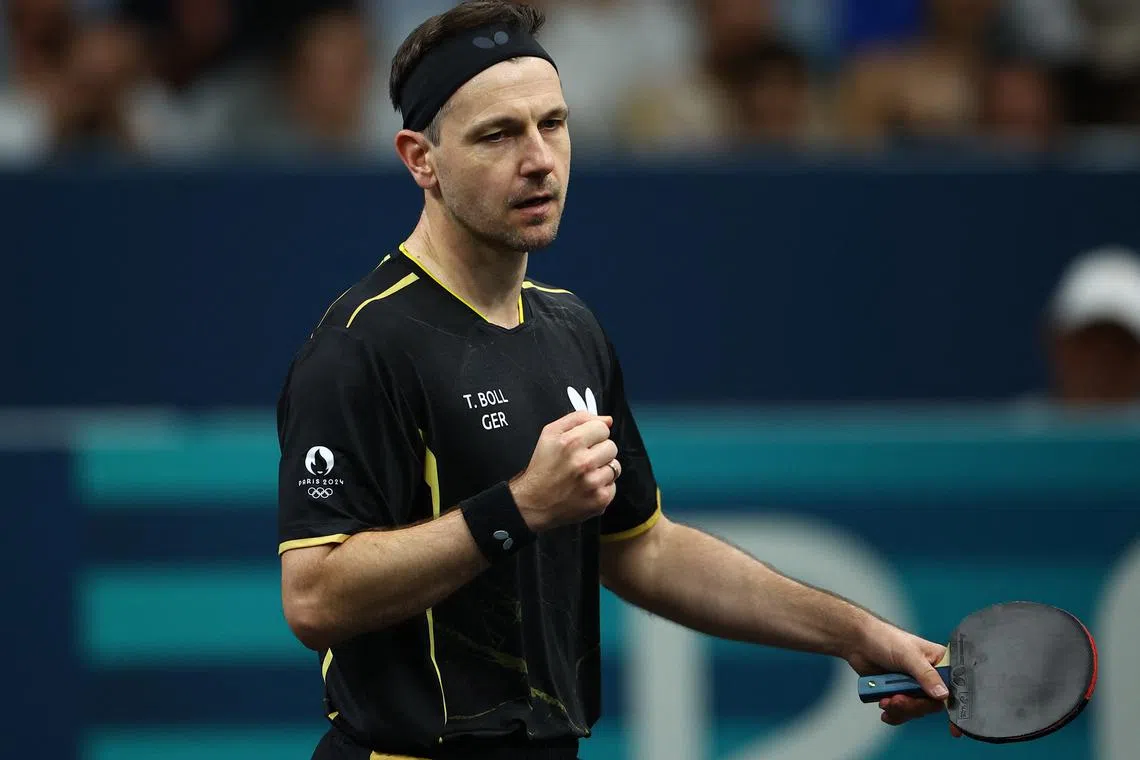 FILE PHOTO: Paris 2024 Olympics - Table Tennis - Men's Team Quarterfinals - South Paris Arena 4, Paris, France - August 06, 2024. Timo Boll of Germany reacts during his quarterfinal match against Anton Kallberg of Sweden. REUTERS/Kim Hong-Ji