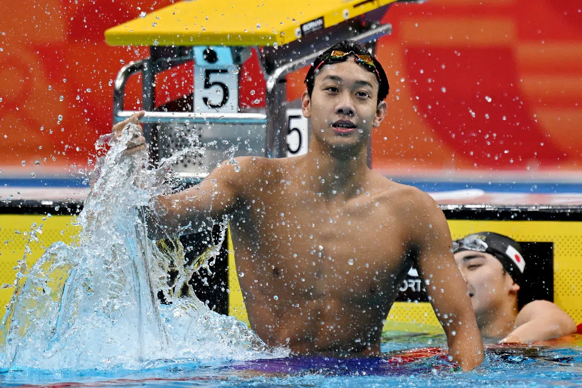 China’s Zhang Zhanshuo celebrates after winning gold medal in Men’s 400m Freestyle.