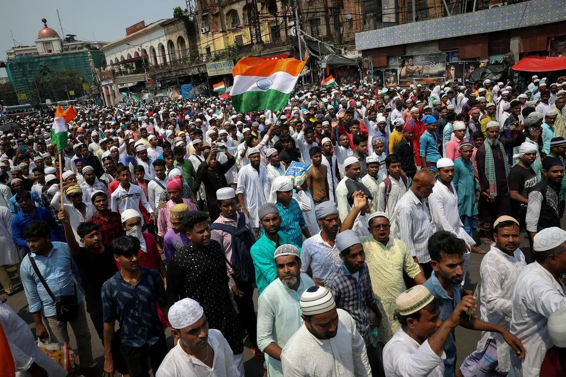 Muslims shout slogans during a protest demanding the arrest of Bharatiya Janata Party (BJP) member Nupur Sharma for her comments on Prophet Mohammed, in Kolkata, India, June 14, 2022. 