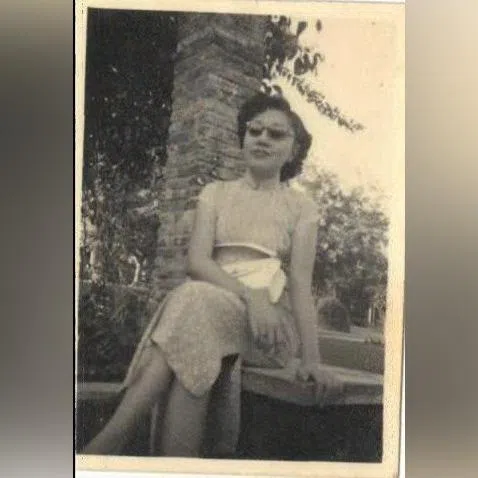 The writer's mother. Reading her mother's old love letters allowed the writer to see her more fully. 